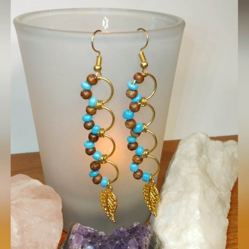 Handmade Glass Turquoise and wood beads earrings with Leaves.